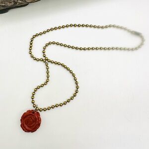 Vintage carved coral flower pendant necklace